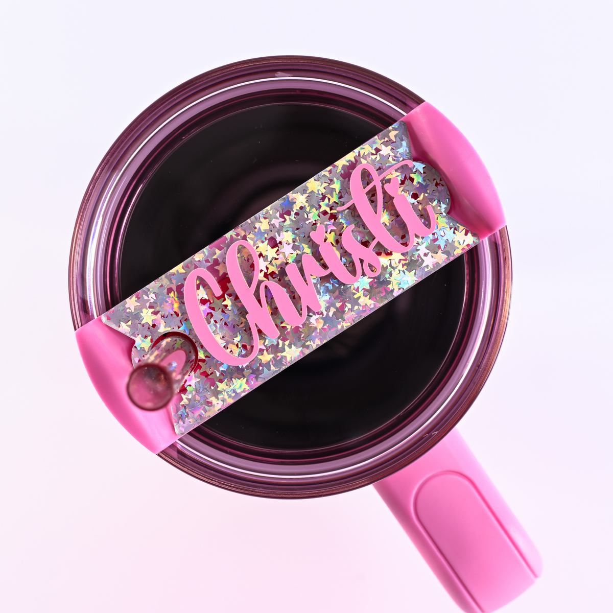 Sparkly glitter star Topper Tag showing personalized names on Stanley Quencher tumblers with shimmering acrylic construction