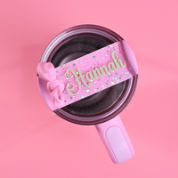 Stanley loveshackfancy ibiza sunset quencher with a sugared pastel pink topper tag