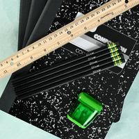 Black personalized pencils showing custom name stamping in metallic foil