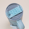 Topper Tag perfect pair Stanley Blueberry Milk Quencher showing custom name tag attachment