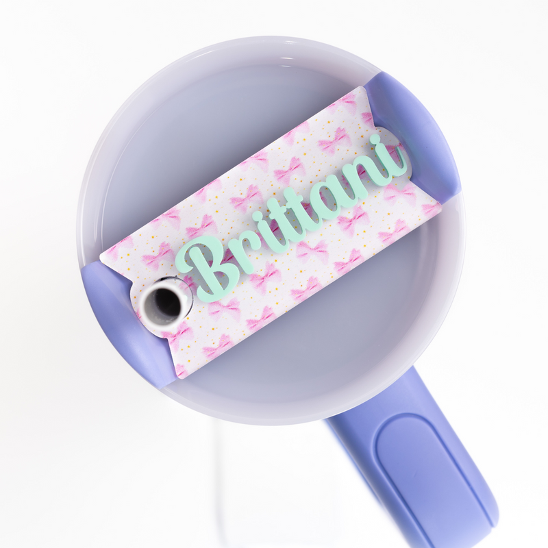 Topper Tag blush bows design for Stanley Quencher showing custom name tag attachment