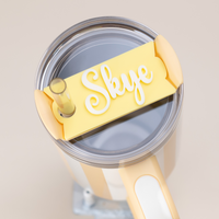 Topper Tag perfect pair Stanley Butter Cabana Gloss Quencher showing custom name tag attachment in pina colada