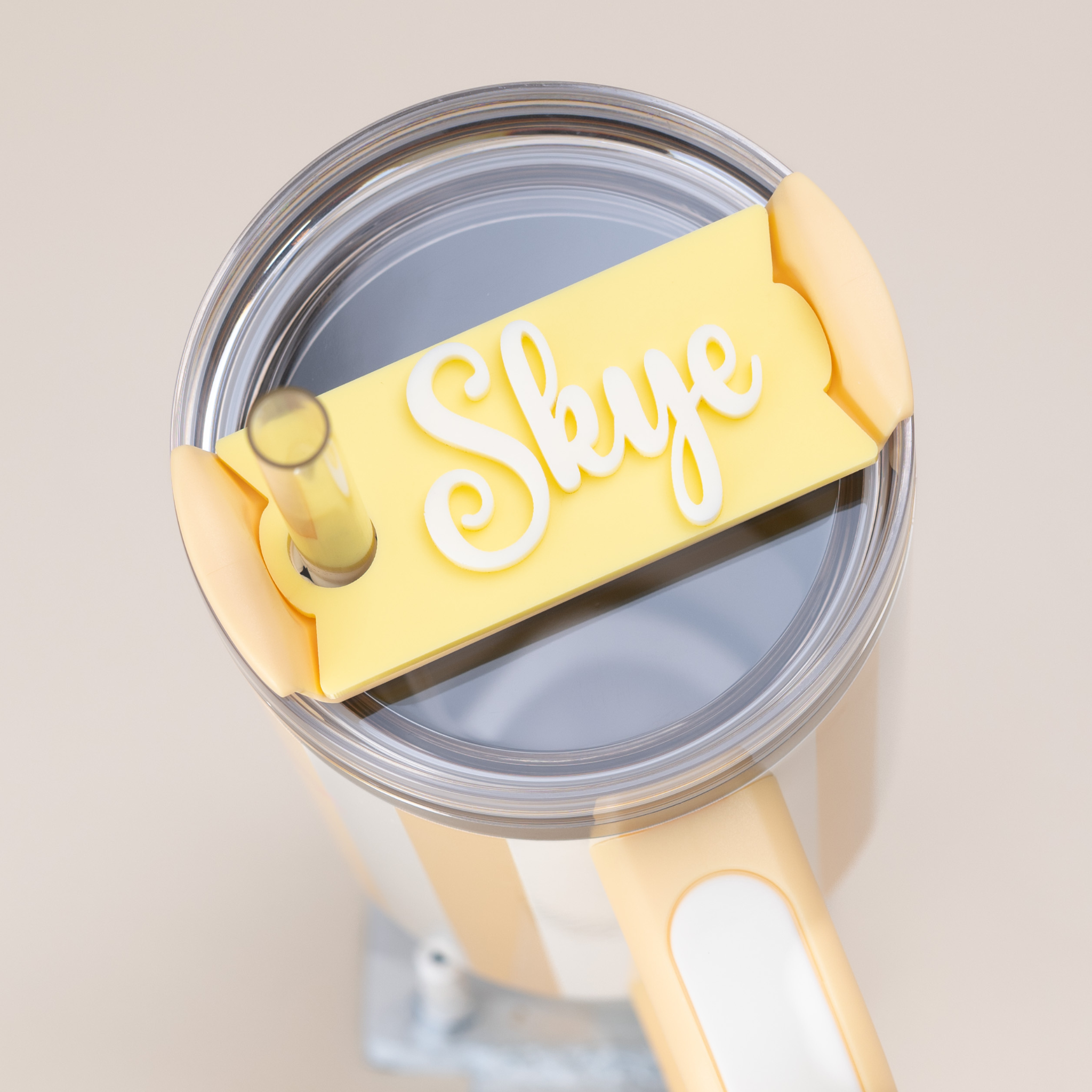 Topper Tag perfect pair Stanley Butter Cabana Gloss Quencher showing custom name tag attachment in pina colada