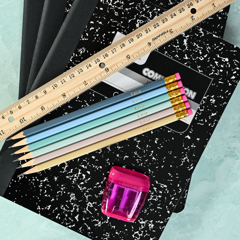 Beach tones personalized pencils showing custom name stamping in metallic foil