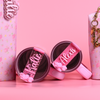 Stanley loveshackfancy ibiza sunset quencher with a pink shimmer and pink glitter topper tag