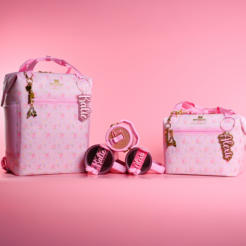 Love Shack Fancy Ibiza Sunset floral-patterned bags with matching Southern Supply bag tags and topper tags