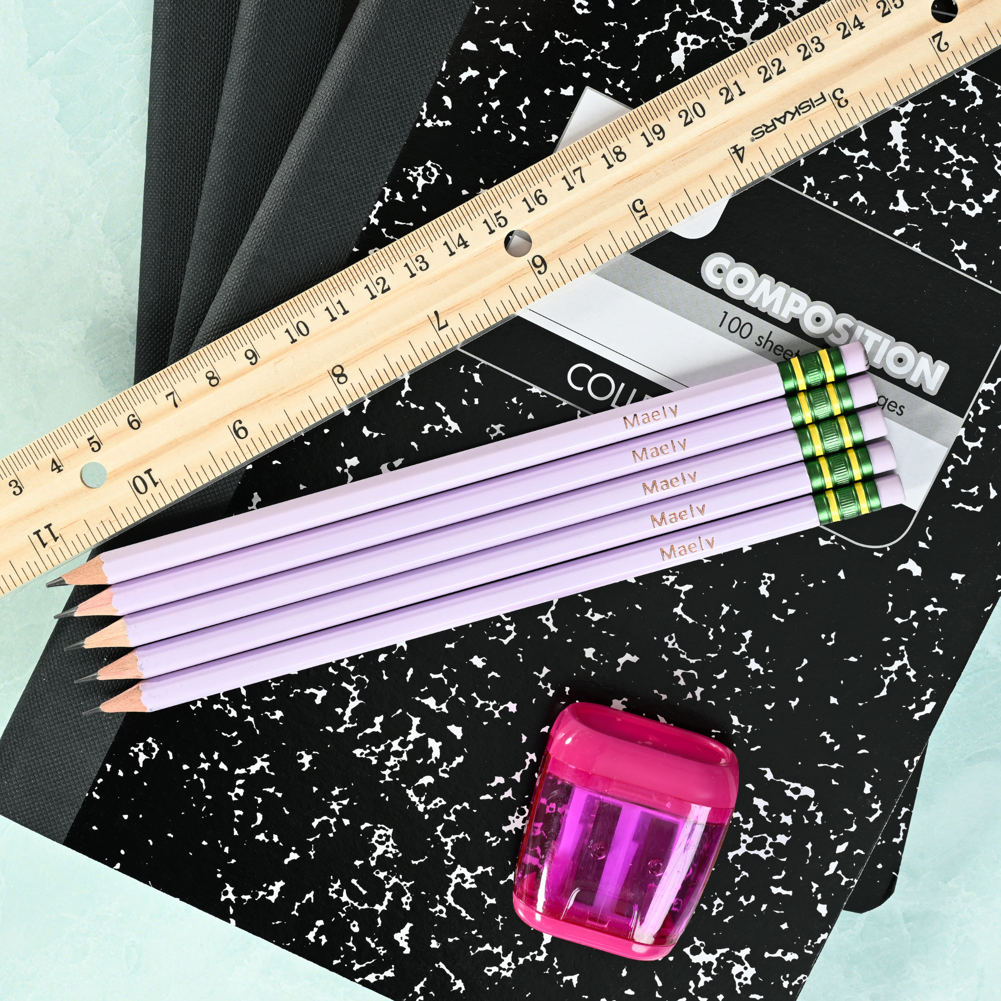 Lilac personalized pencils showing custom name stamping in metallic foil