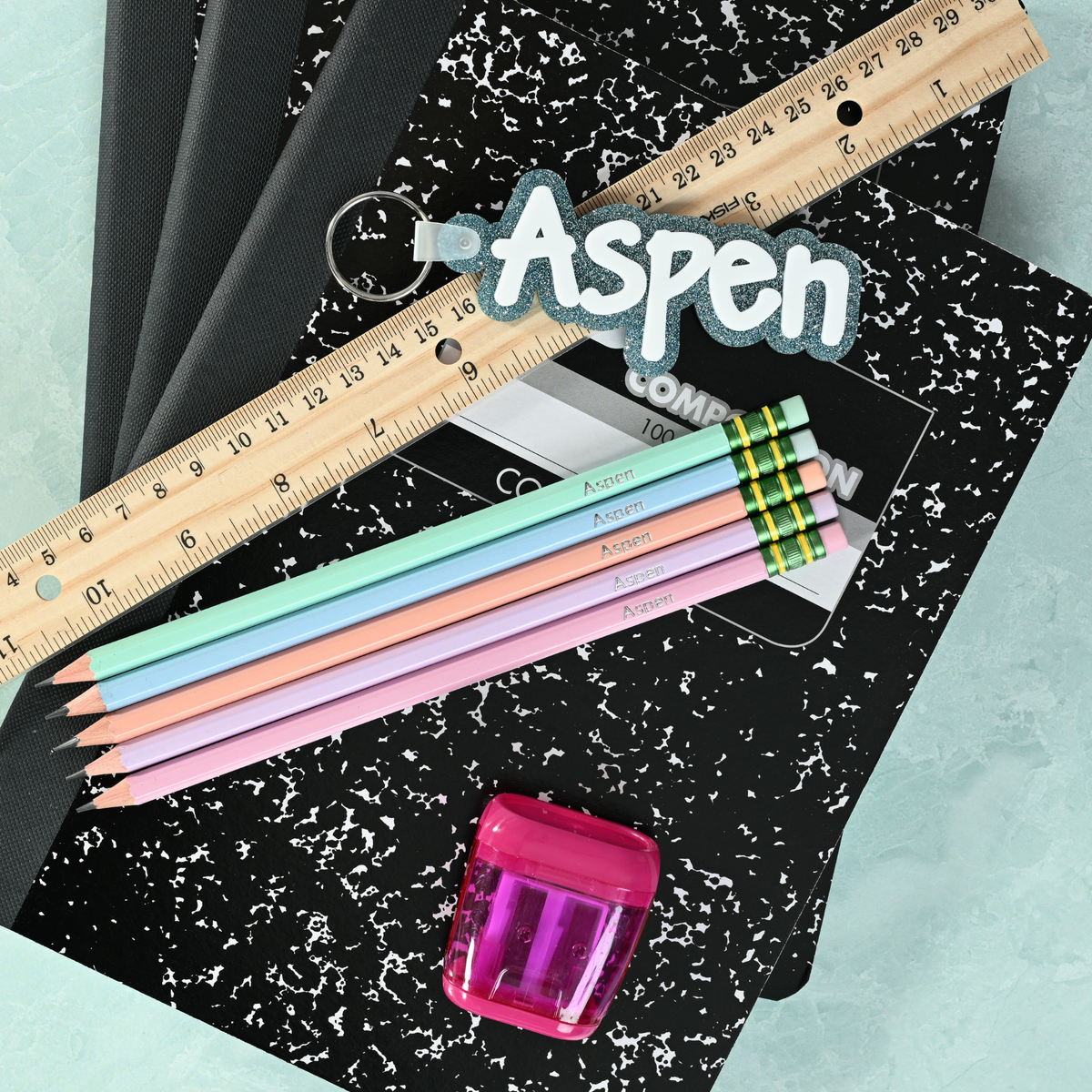 Pastel personalized pencils showing custom name stamping in metallic foil