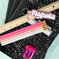 Pink ombre personalized pencils showing custom name stamping in metallic foil