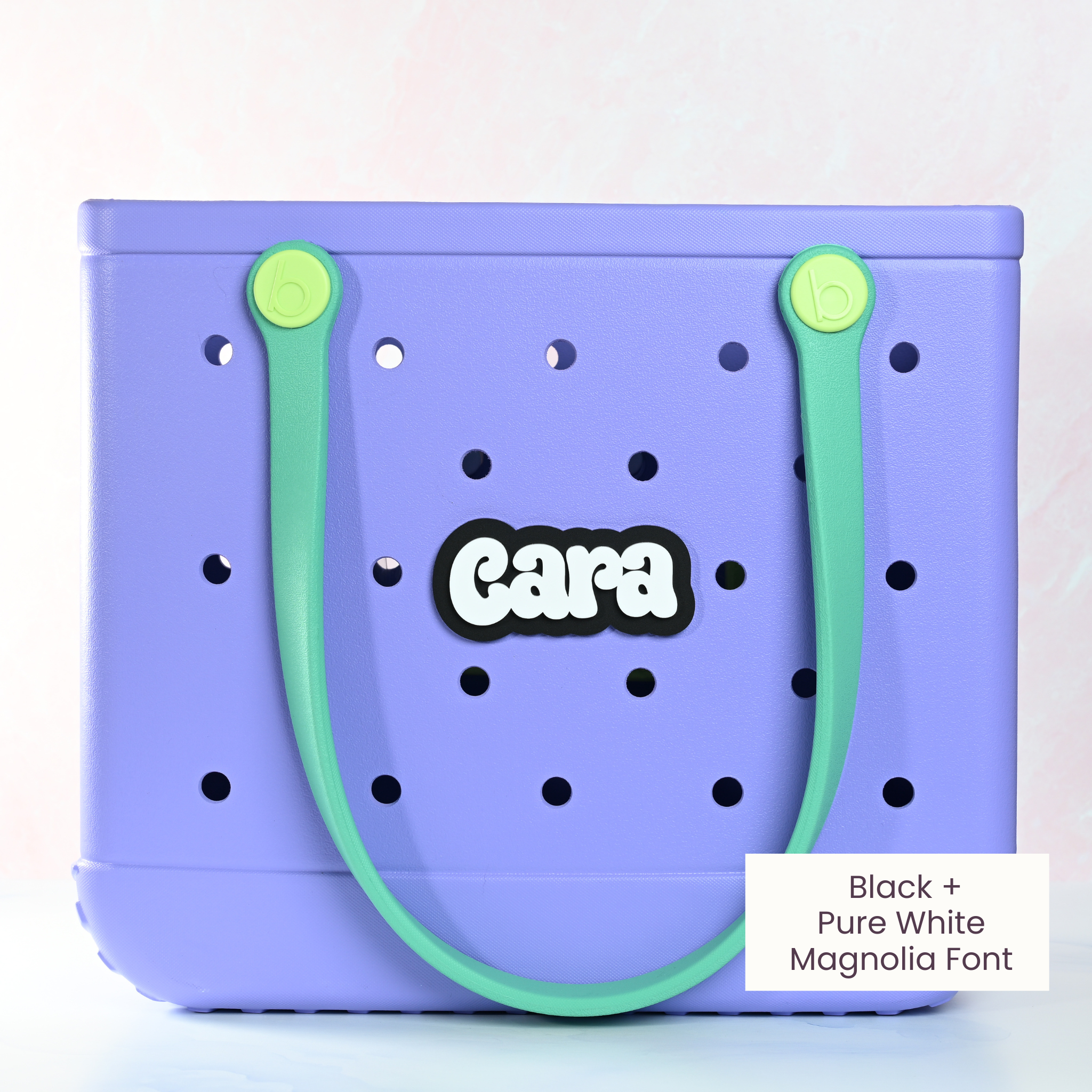 Personalized boggy button Custom Tote Bag Charm attached to a bogg bag with black boggy button