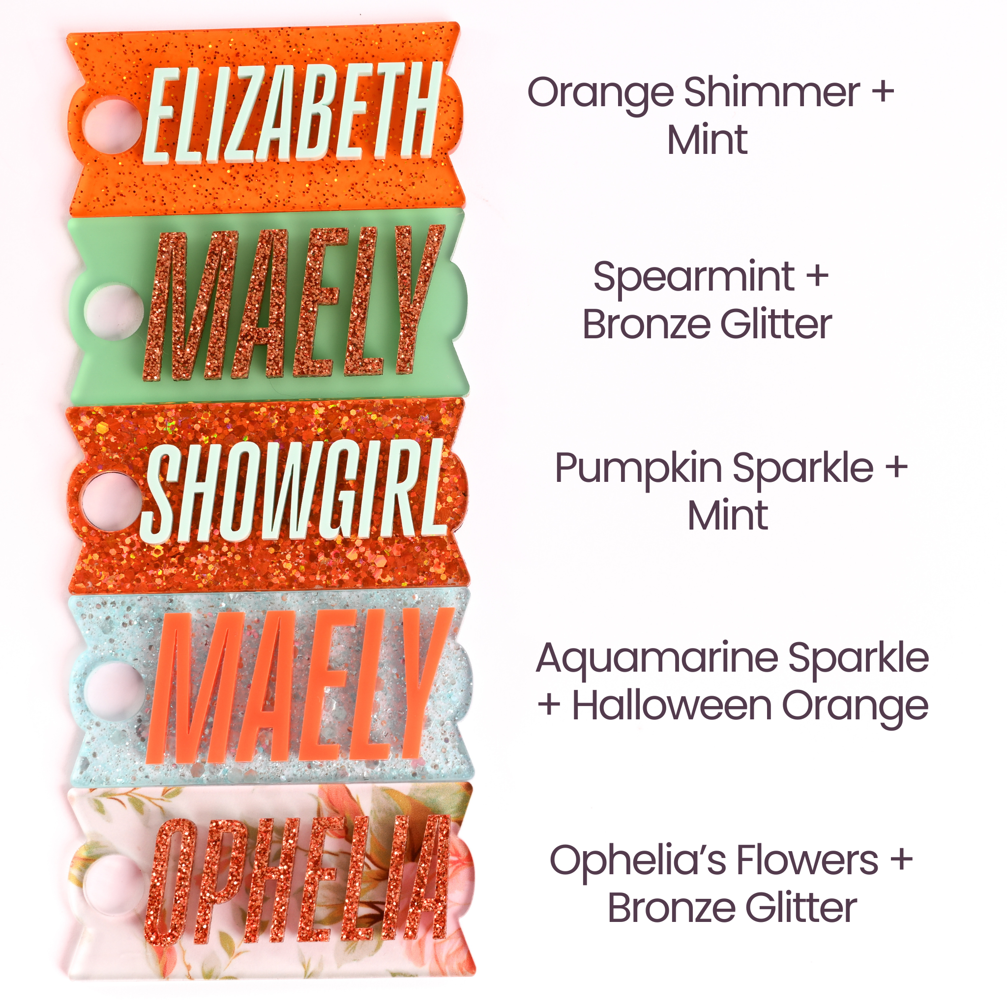 The life of a showgirl themed Stanley name tags for stanley quencher tumblers in orange shimmer with mint, Spearmint with bronze glitter, pumpkin sparkle with mint, aquamarine sparkle with halloween orange, and Ophelia's Flowers with bronze glitter