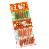 The life of a showgirl themed Stanley name tags for stanley quencher tumblers in orange shimmer with mint, Spearmint with bronze glitter, pumpkin sparkle with mint, aquamarine sparkle with halloween orange, and Ophelia's Flowers with bronze glitter