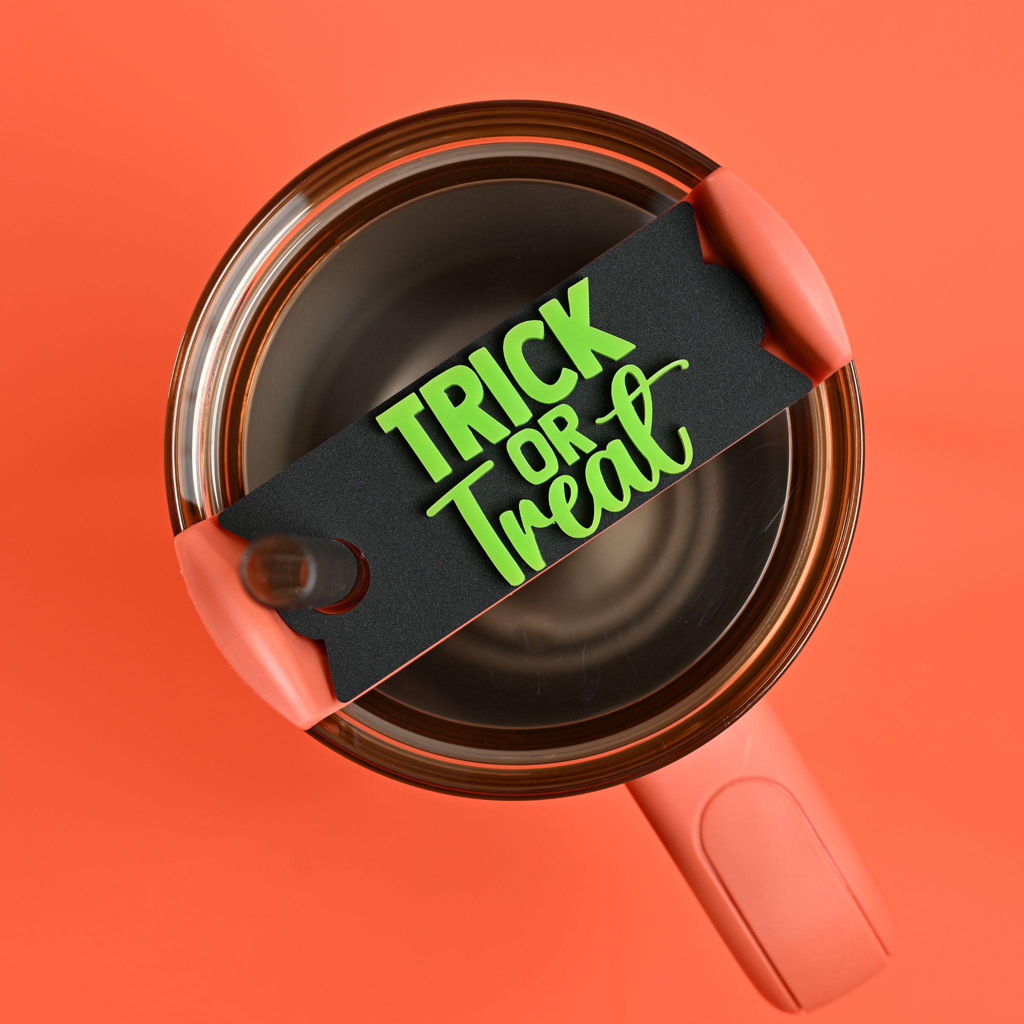 Topper Tag displaying "Trick or Treat" fall phrase design for Stanley Quencher with Halloween theme