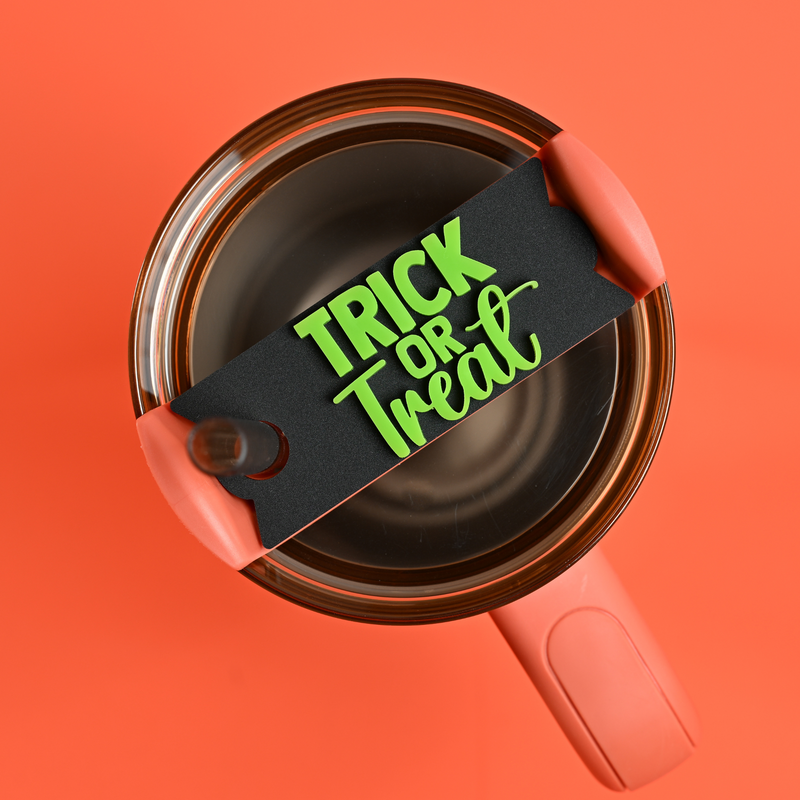Topper Tag displaying "Trick or Treat" fall phrase design for Stanley Quencher with Halloween theme