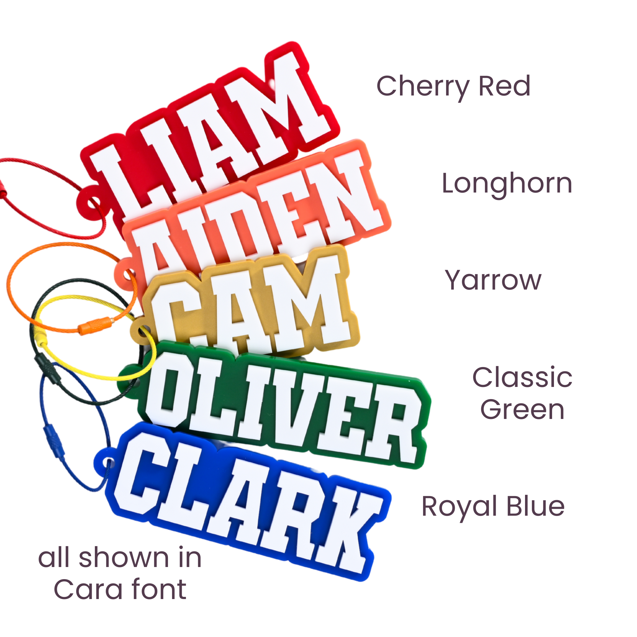 Personalized varsity bag tags showing custom name engraving on durable acrylic with key ring attachment